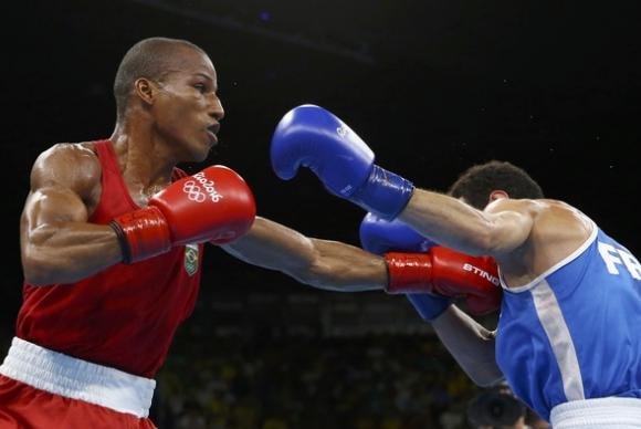 Robson Conceição ganha o primeiro ouro para o boxe do BrasilReuters/Peter Cziborra)